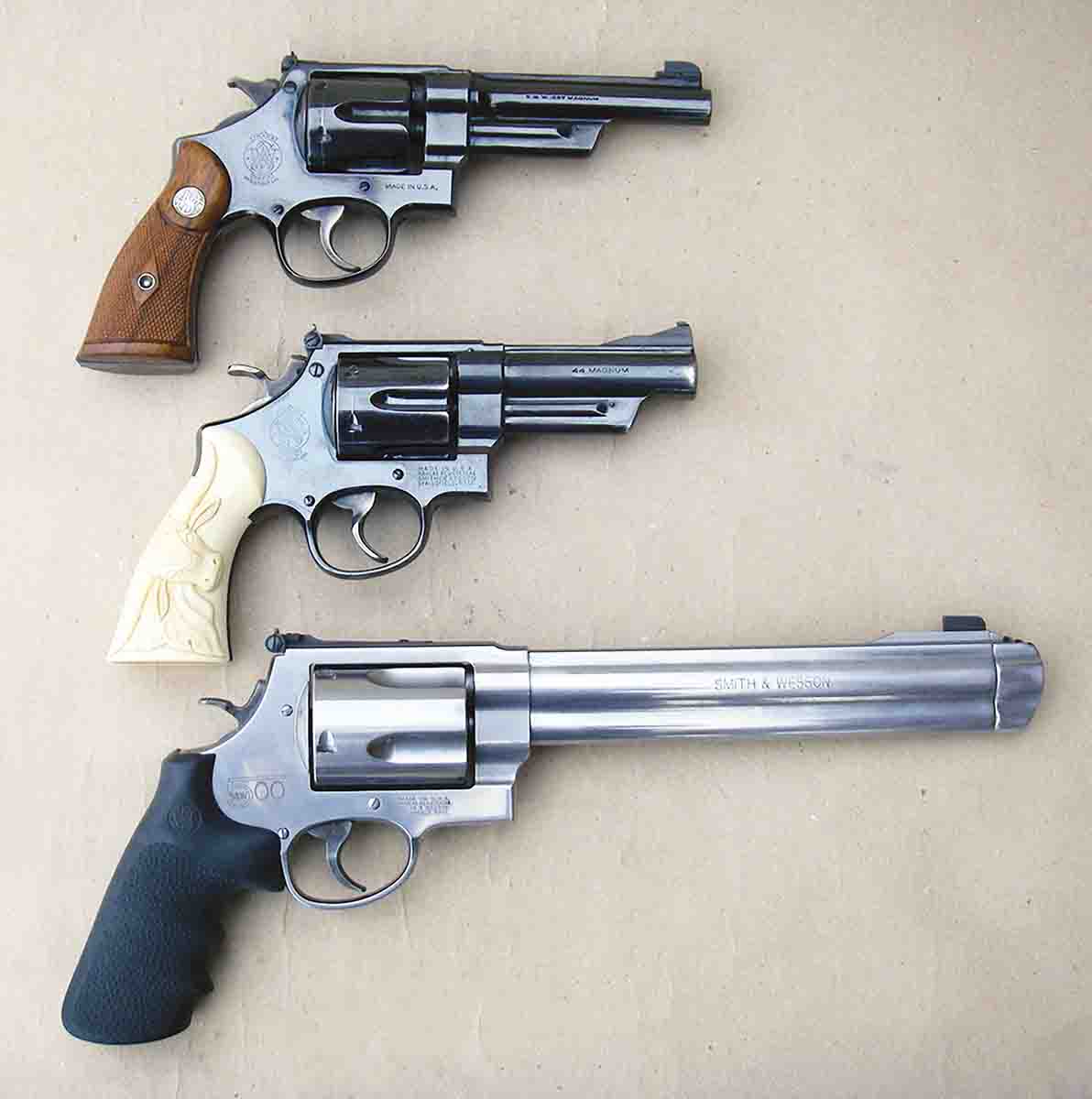 Smith & Wesson has a colorful history of developing magnum revolver cartridges. Top to bottom: Smith & Wesson .357 “Registered” Magnum (circa 1935), Smith & Wesson (pre-Model 29) .44 Magnum (circa 1955), Smith & Wesson Model 500 (circa 2003).